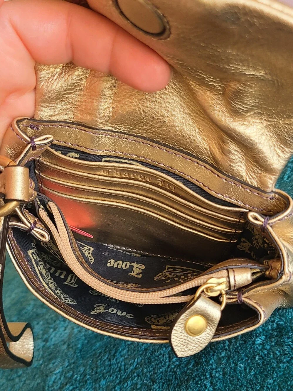 Y2K vintage metallic gold leather Juicy Couture wristlet featuring Heart Accent